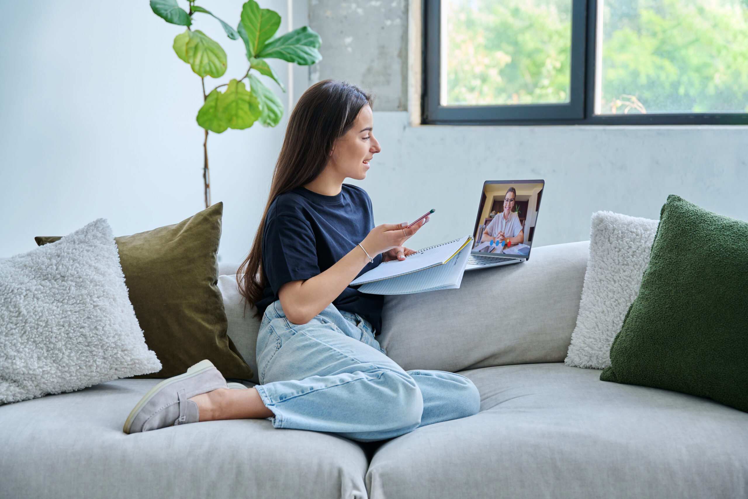 A person in an online therapy session from the comfort of home in Ontario